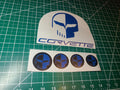 C6 CORVETTE RACING "JAKE" SKULL ENGINE BAY OVERLAYS FOR POWER STEERING, OIL, RADIATOR OVERFLOW, BRAKE FLUID CAPS, & fuse panel cover.